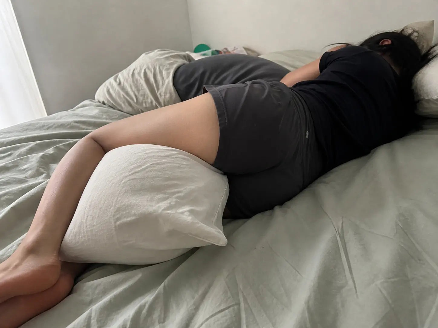Side sleeper with knees pressed together